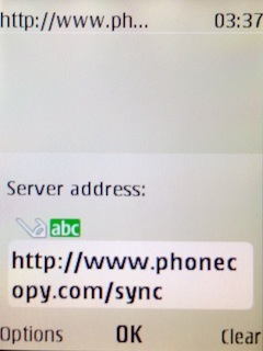 Write http://www.phonecopy.com/sync into the server address field